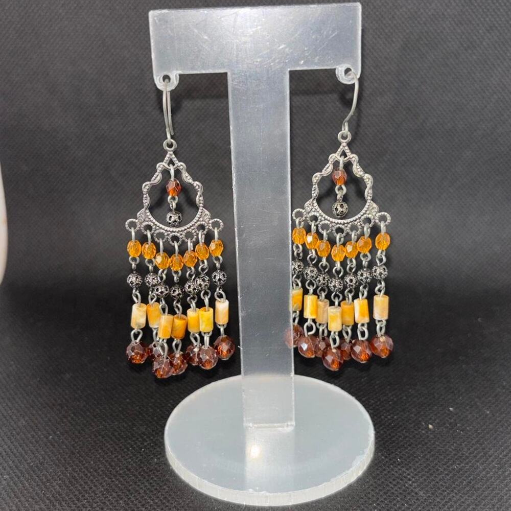 Silver earrings with orange and